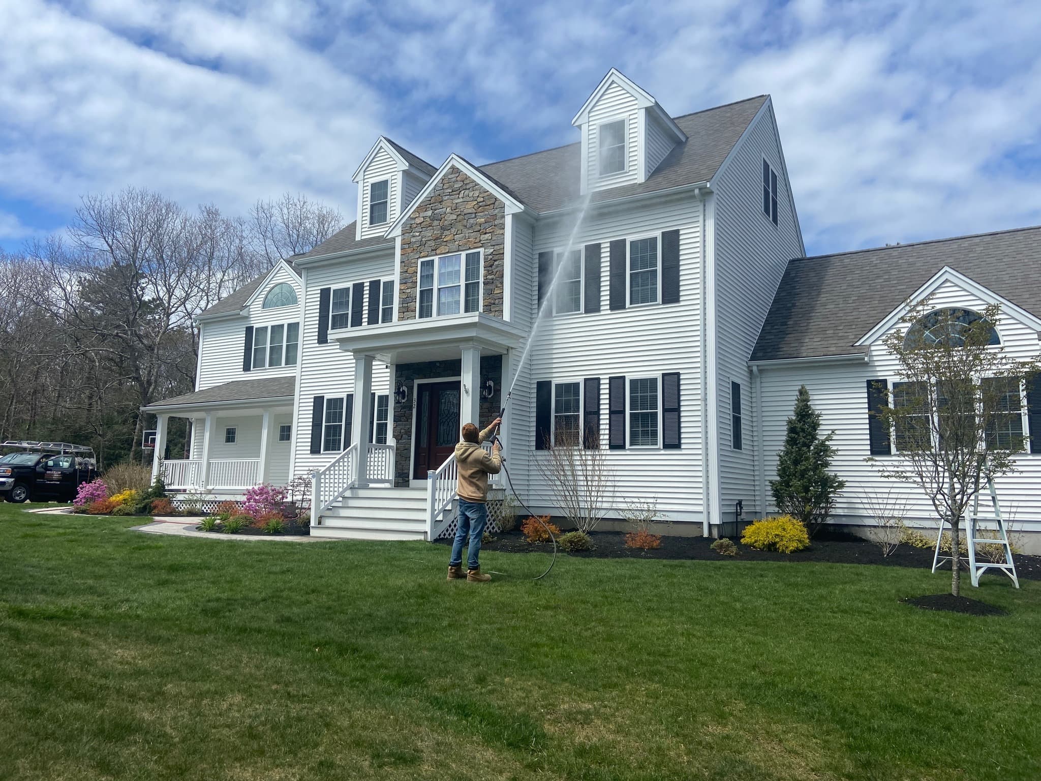 Professional Power Washing Service in Plymouth MA - Graham Power Washing crew cleaning exterior surfaces